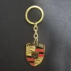 3c041486-870c-403f-8499-82a7fa47cf57 copy Car keychain Double Faced logo for Porsche Gold