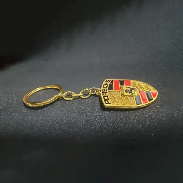 b6059ab5-68f9-47ef-b662-79e84197f724 copy Car keychain Double Faced logo for Porsche Gold